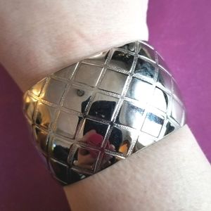 Cuff bracelet criss cross style silver tone metal bold thick